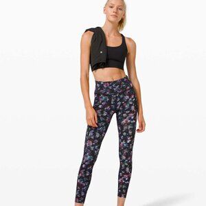 Like new! Lululemon Fast and Free Tight / leggings / pants 25" black purple pink